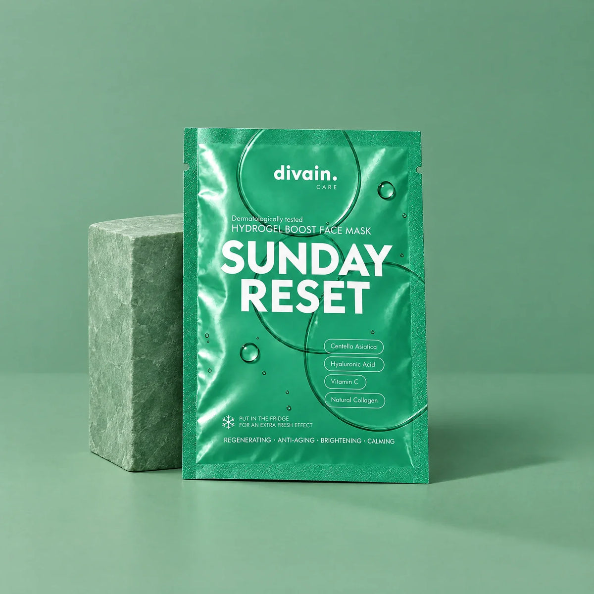 Sunday Reset hydrogel mask by divain. Care on a green background