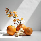 Orange and ginger representing the olfactory notes of the perfume.