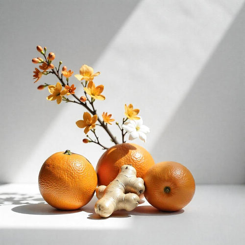 Orange and ginger representing the olfactory notes of the perfume.