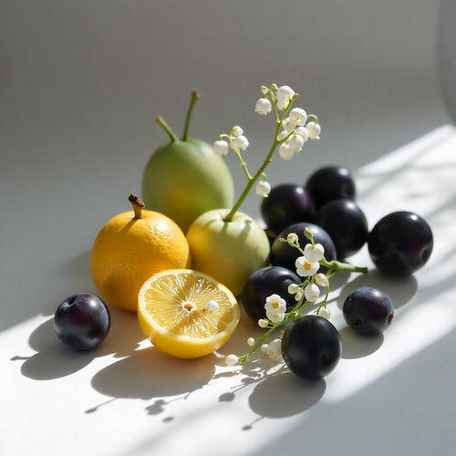 Indian mandarin and plum representing the olfactory notes of the perfume.