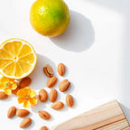 Lemon, almond and cedar representing the olfactory notes of the perfume.