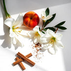 Perfume scent notes with white lilies, peach and cinnamon stick