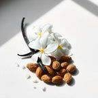Jasmine, vanilla and almond representing the olfactory notes of the perfume.