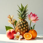 Pineapple, mandarin, lotus flower and rose representing the olfactory notes of the perfume.