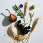Fig, wheat, barley and blackcurrants representing the olfactory notes of the perfume.