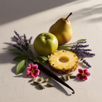 Pear, pineapple, lavender and vanilla representing the olfactory notes of the perfume.