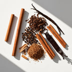 Cinnamon, pepper, tobacco leaves and vanilla representing the olfactory notes of the perfume.