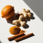 Cinnamon, orange and ginger representing the olfactory notes of the perfume.