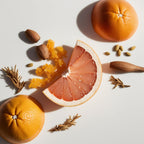 Grapefruit, ambroxan and wood representing the olfactory notes of the perfume.