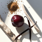 Perfume scent notes with purple plum, vanilla, wood and aromatic seeds