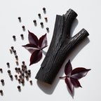 Black pepper, violet leaves and wood representing the olfactory notes of the perfume.