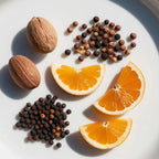 Nut and black pepper representing the olfactory notes of the perfume.
