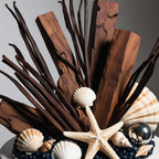 Olfactory notes of the perfume with warm woods, soft vanilla and a salty marine touch.