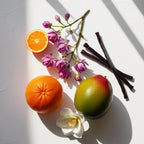 Mandarin, licorice, mango and gardenia representing the olfactory notes of the perfume.