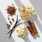 Popcorn, vanilla and wood representing the olfactory notes of the perfume.