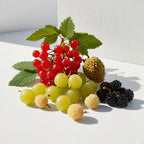 Gooseberry, lychee and elderberry representing the olfactory notes of the perfume.