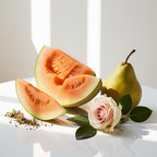 Melon, pear and rose representing the olfactory notes of the perfume.