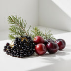 Plum, thyme and blackcurrant representing the olfactory notes of the perfume.