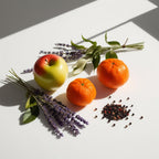 Apple, mandarin, pepper and lavender representing the olfactory notes of the perfume.