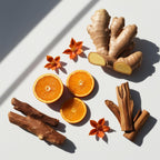 Orange and ginger representing the olfactory notes of the perfume.