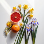 Grapefruit, narcissus and lily representing the olfactory notes of the perfume.