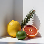 Grapefruit, lemon and cypress representing the olfactory notes of the perfume.