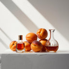 Apricot, cognac and rum representing the olfactory notes of the perfume.