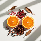 Orange, pink pepper and cocoa representing the olfactory notes of the perfume.