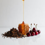 Thousand, cherry and tobacco representing the olfactory notes of the perfume.