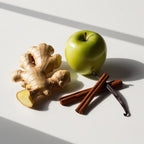 Apple, ginger, cinnamon and vanilla representing the olfactory notes of the perfume.