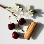 Cherry, wood and jasmine representing the olfactory notes of the perfume.