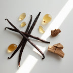 Amber, wood and vanilla representing the olfactory notes of the perfume.